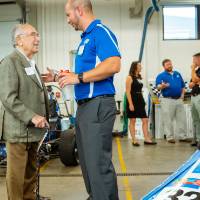 Seymour Padnos speaking with an engineering student.